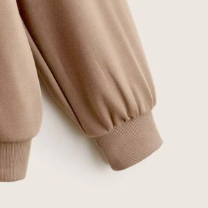 Beige sweater, comes in sizes xs-xl 5 per size